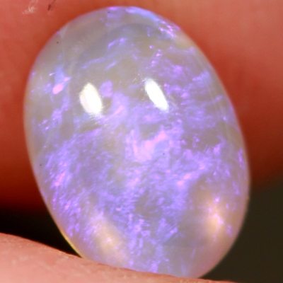 SOLID CRYSTAL OPAL Transparent with rich purple throughout